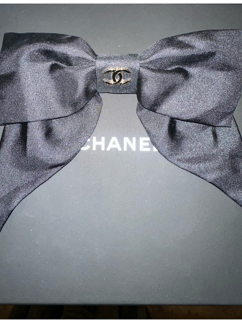 CHANEL Black Satin Bow Hair Clip with Gold CC Accent